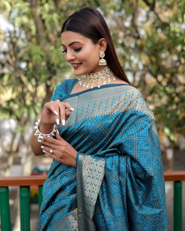 Elegant blue Indian saree featuring intricate Bandhej patterns and luxurious zari detailing, ideal for festivals.