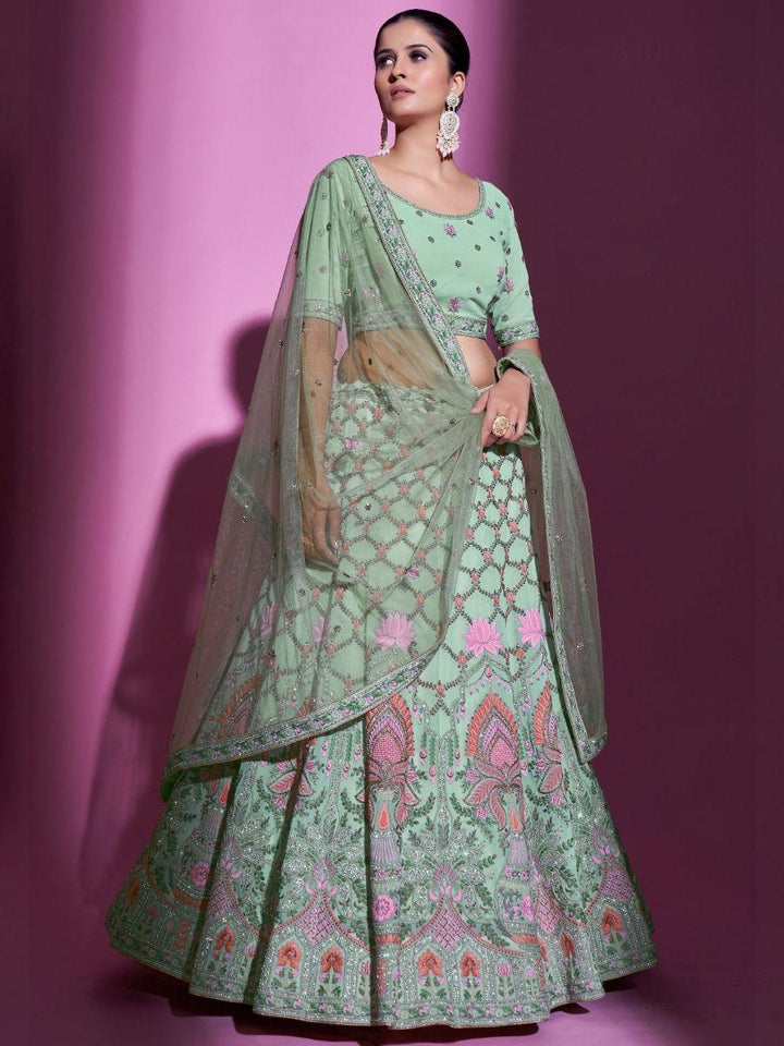 Beautiful pista green lehenga with stone and zari work for weddings.