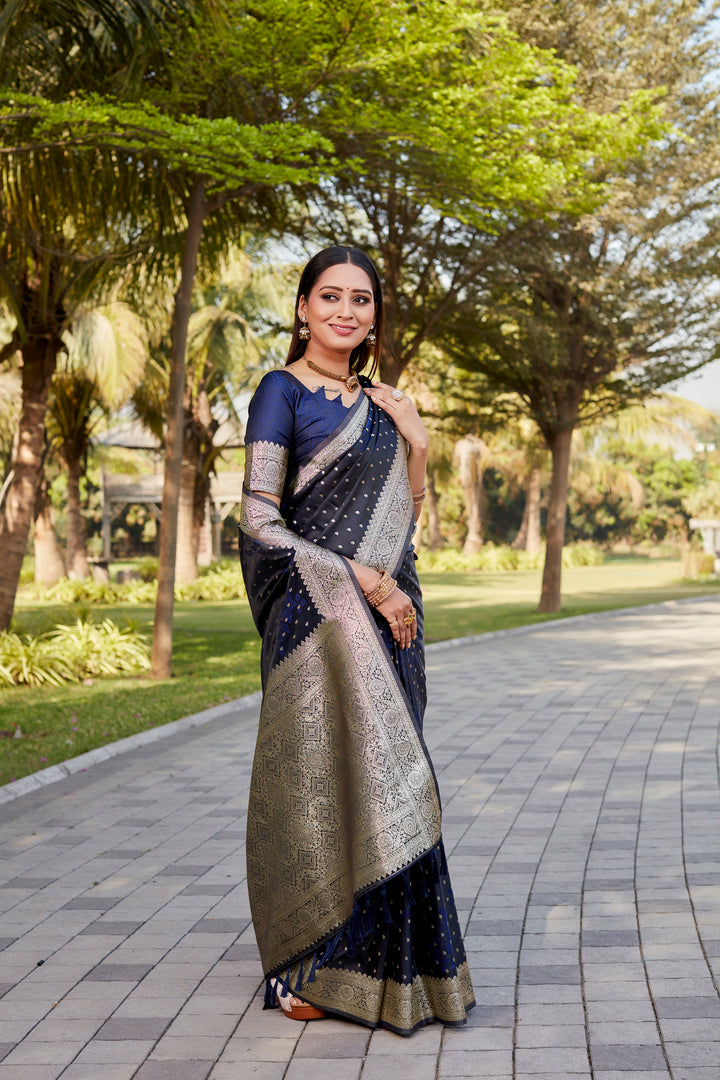 Luxurious navy Soft Satin Kanjivaram saree with intricate butta work and a lustrous finish.