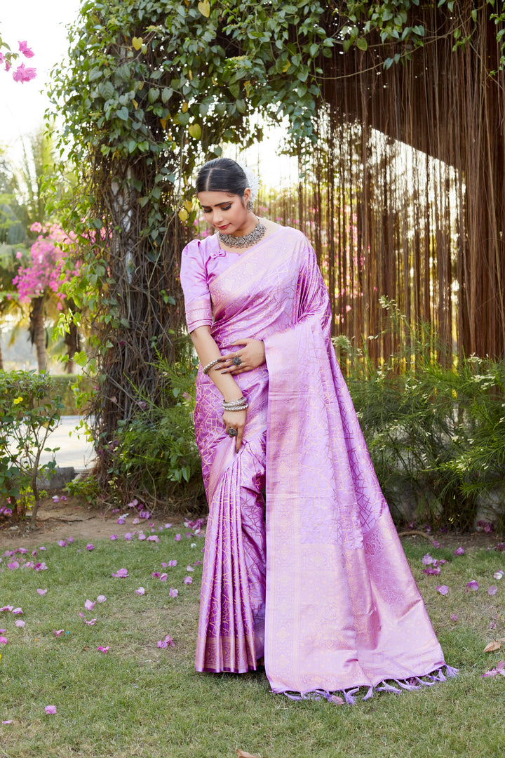 Classic pink Kanjivaram soft satin silk saree with detailed butta work, perfect for weddings and traditional events.