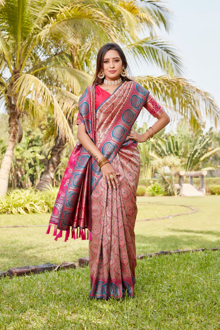 Traditional bright-pink Kanjivaram silk saree with intricate designs and rich pallu for cultural events.