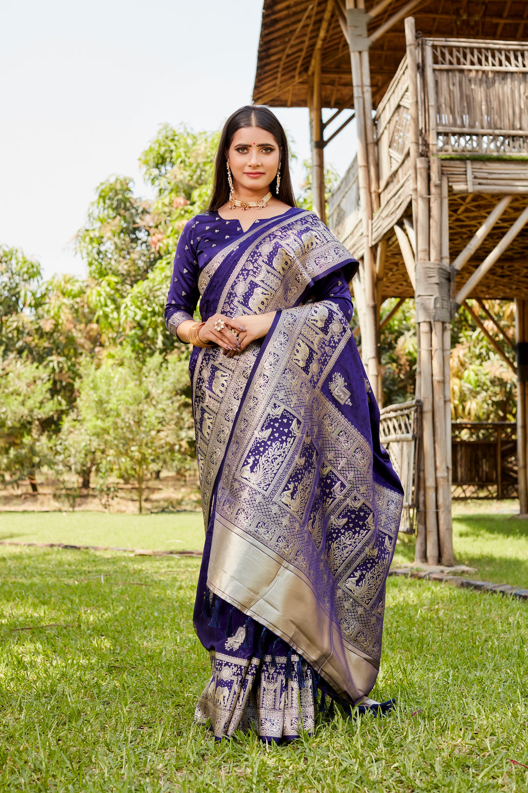 Stunning navy satin Kanjivaram saree with a beautiful elephant border design, ideal for bridal wear and festive occasions.