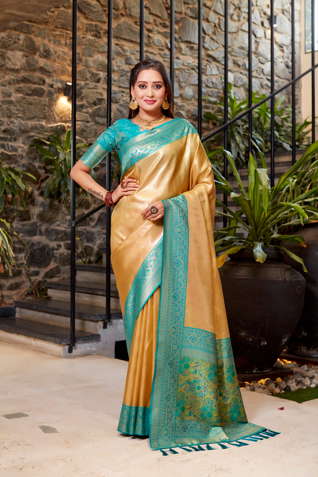 Elegant light-peach Tissue silk saree with delicate weaving and beautiful contrast border.