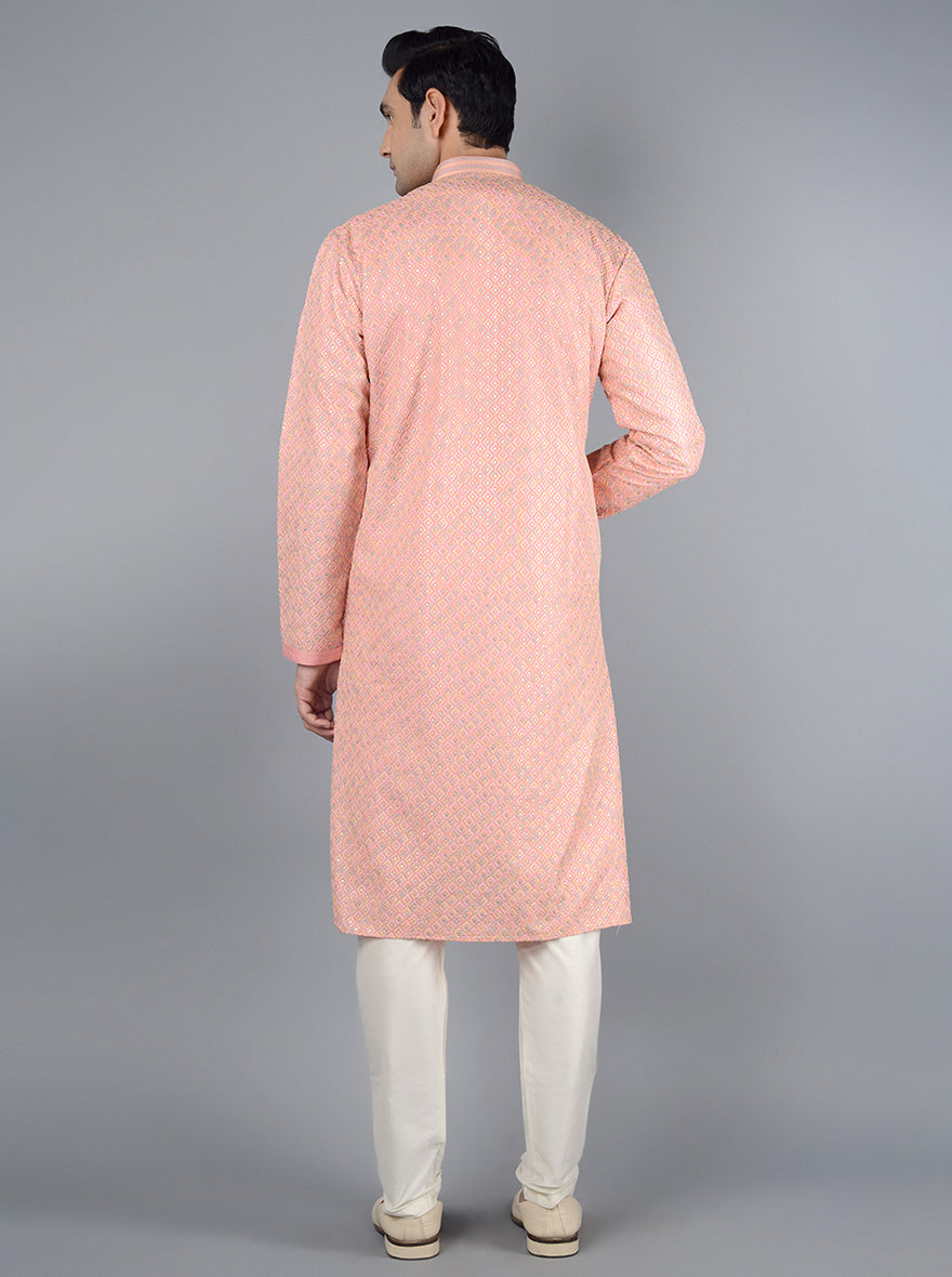 Traditional kurta pajama for men in a beautiful pink hue.