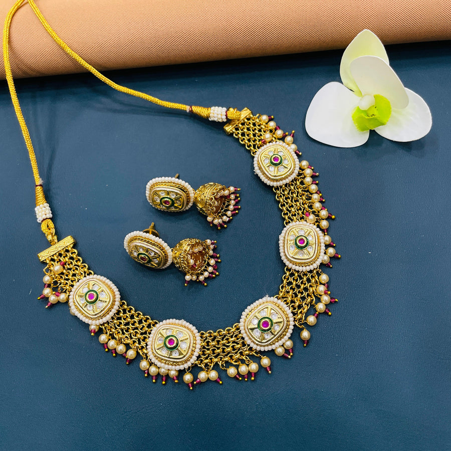 Gorgeous Indian jewelry set featuring intricate gold detailing for brides.