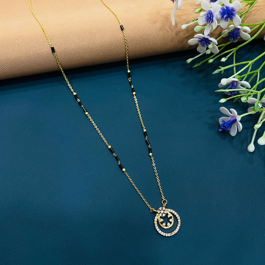 Elegant black and gold mangalsutra, high-quality alloy with gold plating, perfect for weddings.