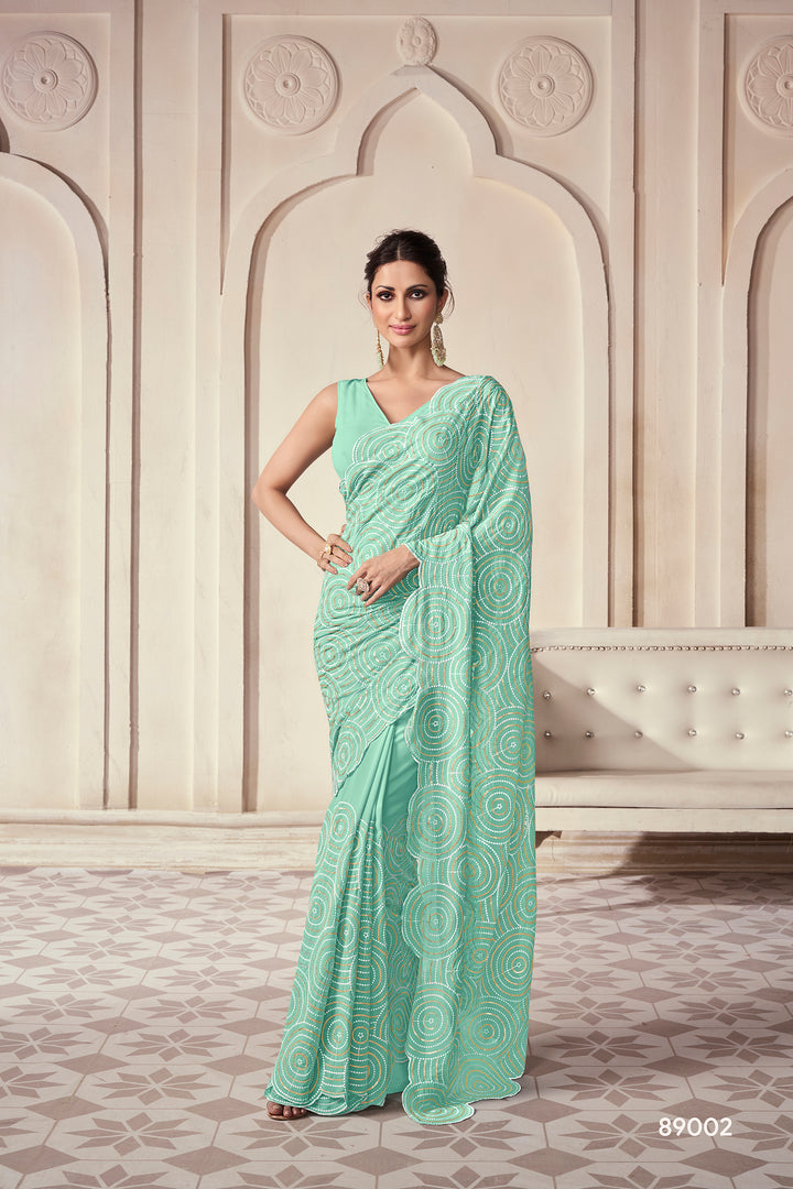 Sea Green Georgette Saree | Contrast Border and Embroidered Work