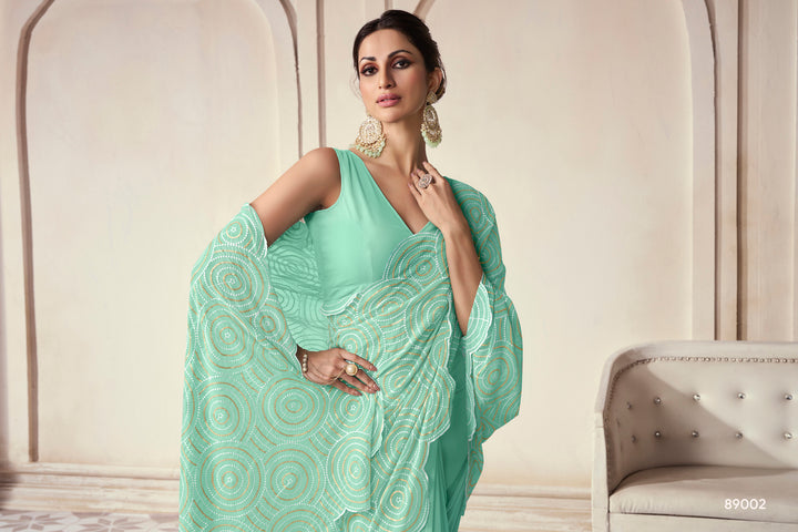 Sea Green Georgette Saree | Contrast Border and Embroidered Work