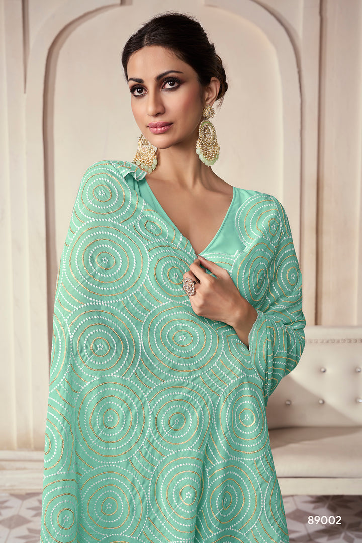 Sea Green Georgette Saree | Contrast Border and Embroidered Work