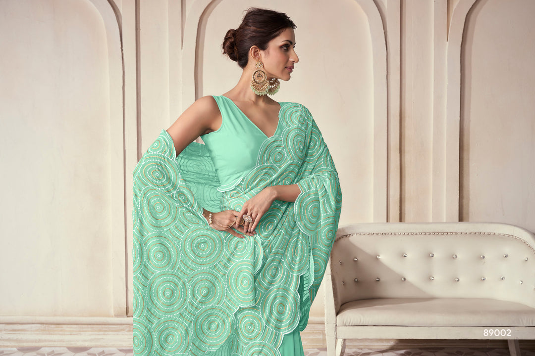 Sea Green Georgette Saree | Contrast Border and Embroidered Work