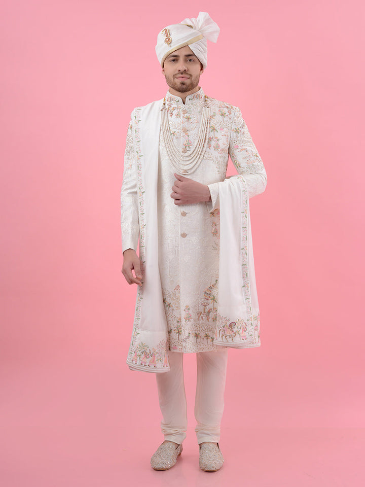 Elevate your wedding look with this Cream Silk Blend Sherwani, featuring intricate embroidery that combines classic and modern styles, making it a perfect choice for celebrations in the USA.