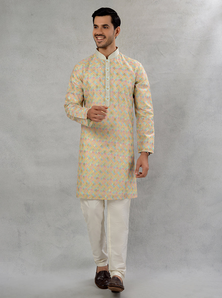 Traditional sea green embroidered kurta pajama with Resham and sequins for Haldi.