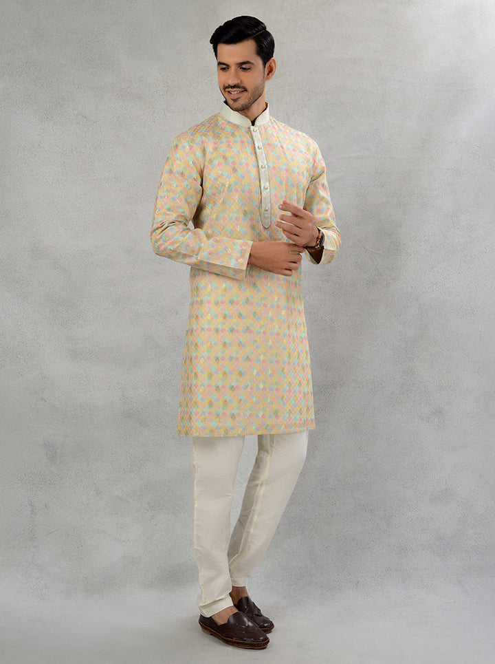 Silk jacquard sea green kurta pajama with intricate Resham & sequins embroidery.