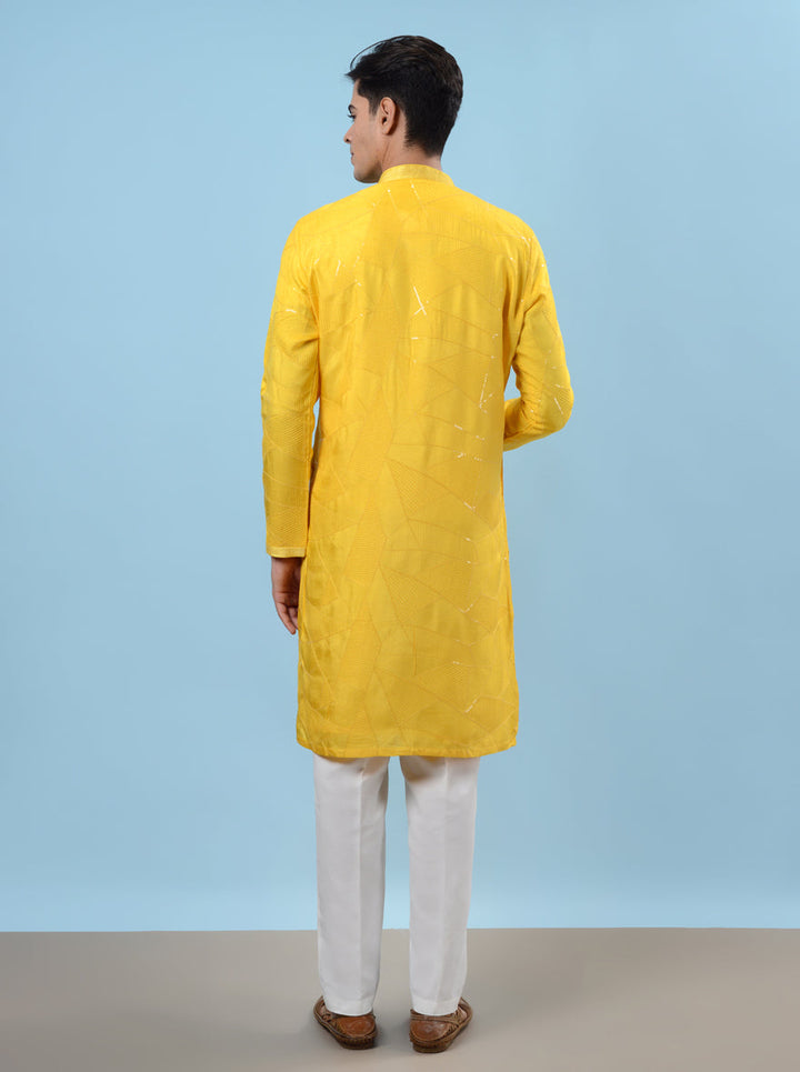 Comfortable yellow kurta pajama, designed for men who appreciate elegance during Haldi celebrations in the USA.