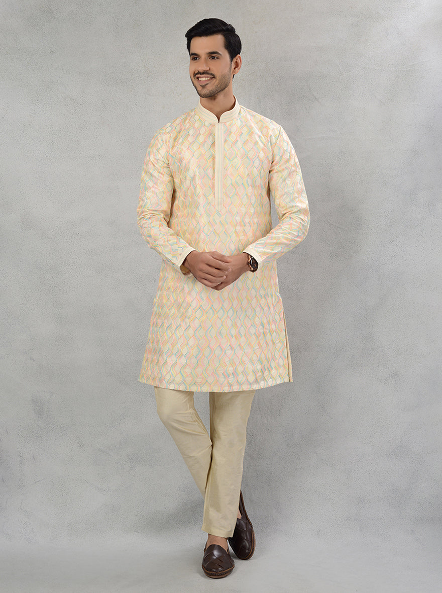 Traditional cream embroidered kurta pajama with Resham work for Haldi.