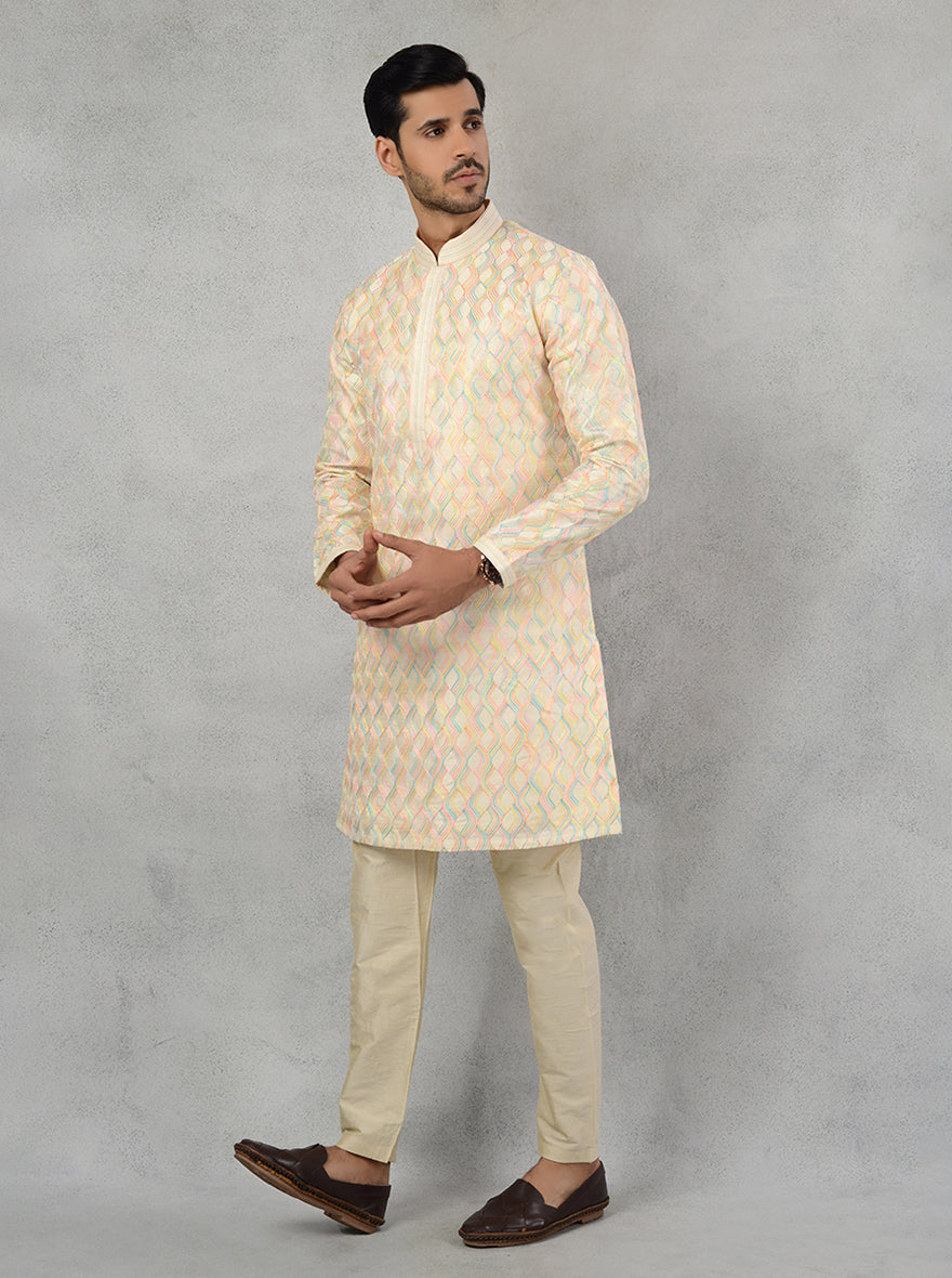 Elegant cream kurta pajama, ideal for USA men embracing tradition at haldi and mehndi events.