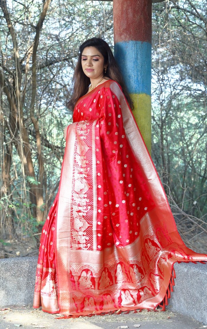 Beautiful blue satin silk saree with exquisite Kanjivaram weaving, perfect for weddings and festive occasions.