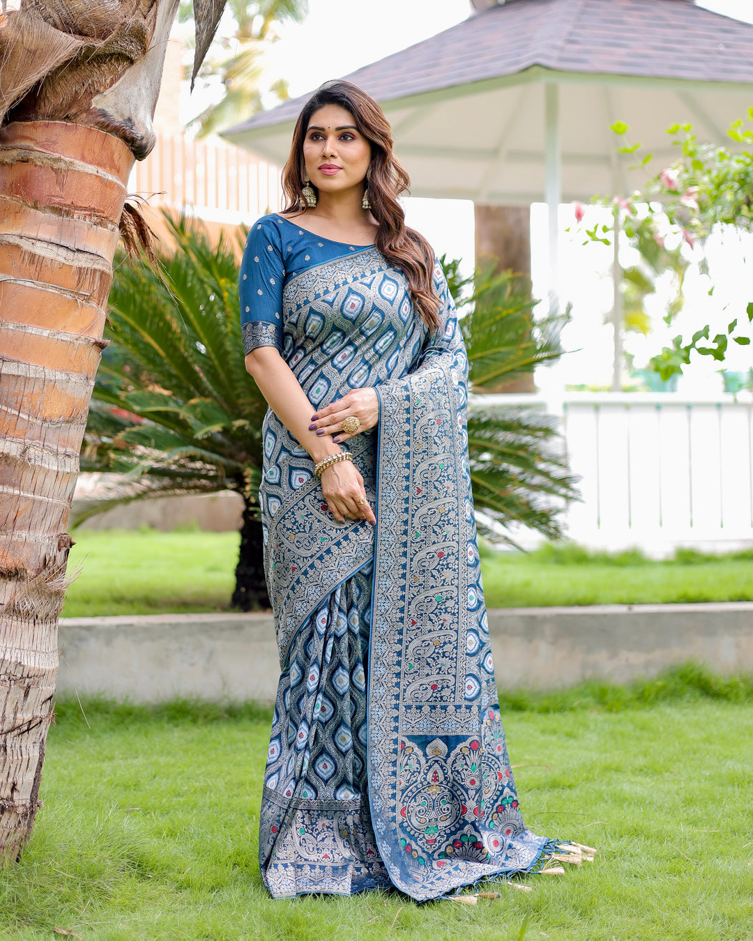 Exquisite blue Kanjivaram Silk Saree featuring luxurious zari embroidery and embossed texture for USA occasions.