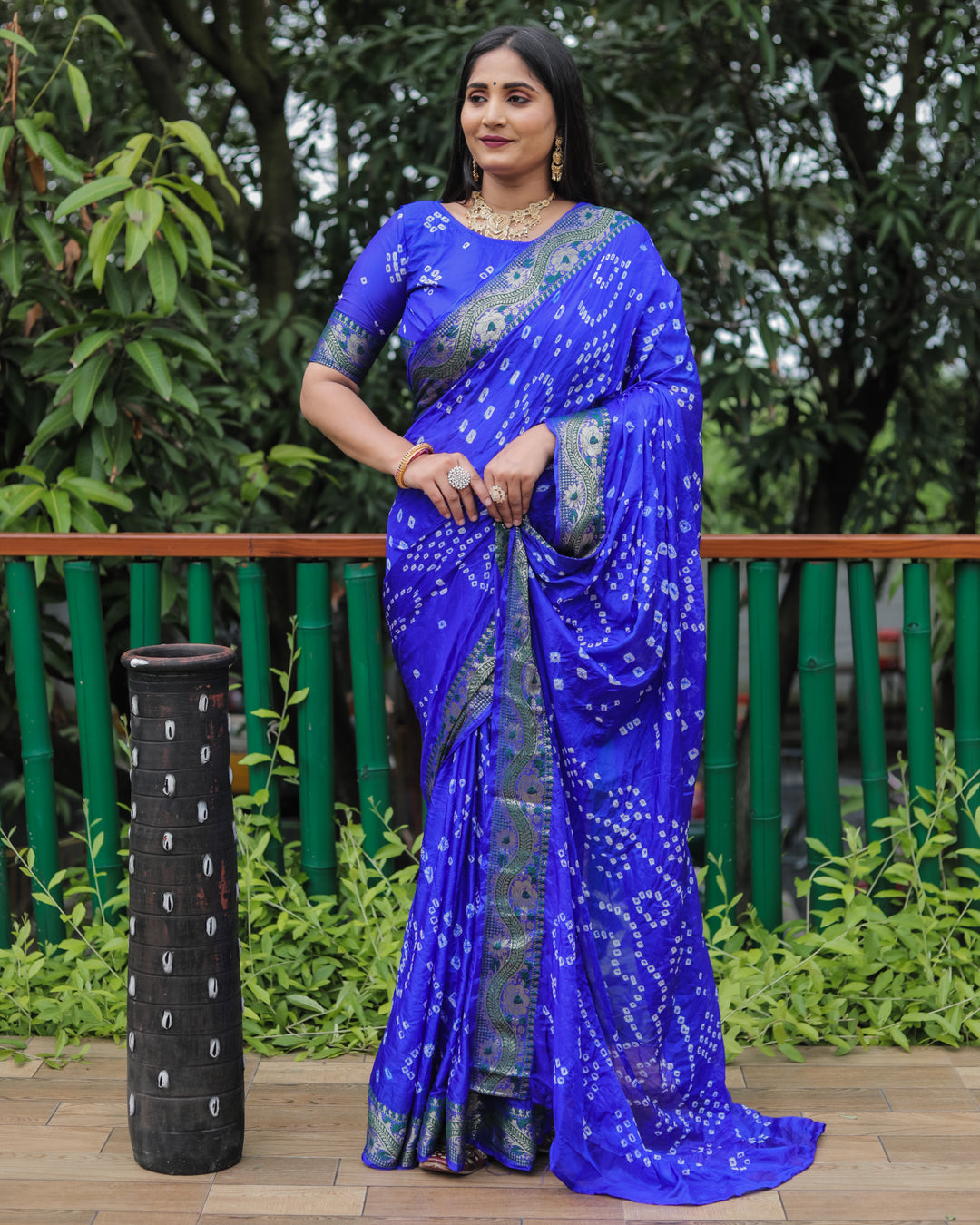 Elegant blue Bandhej silk sadi with intricate Bandhej tie-dye design and bold broad border.