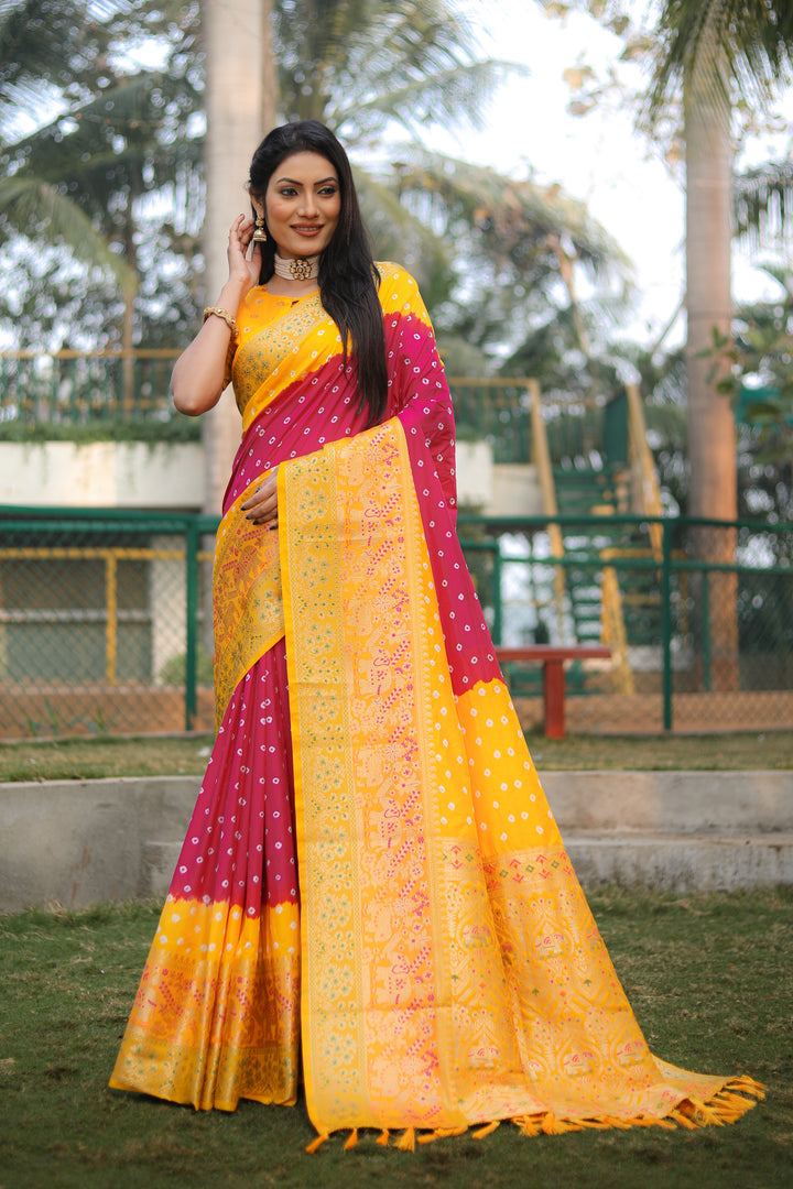 Premium Yellow Bandhej Silk Saree with Kanjivaram border and designer Minakari pallu for bridal wear.