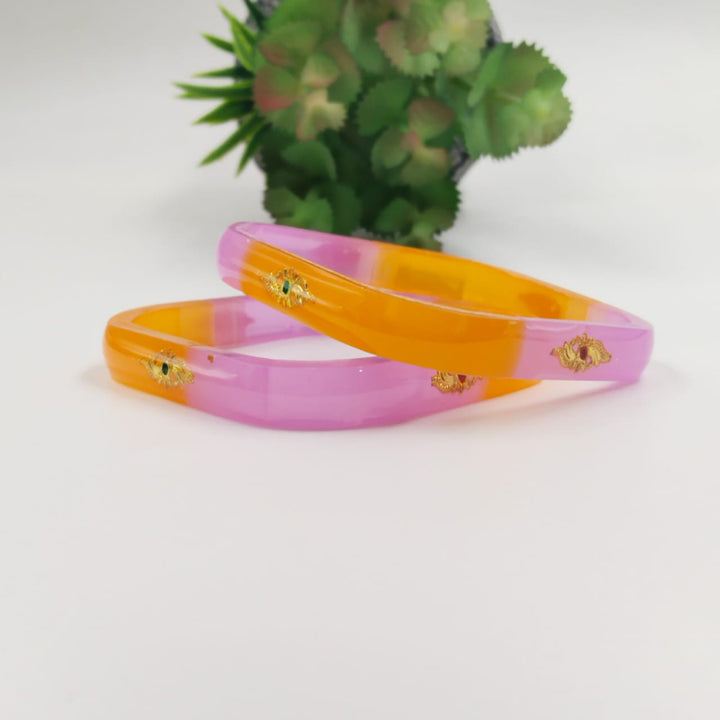 Stylish plastic bangles that can be worn individually or stacked.