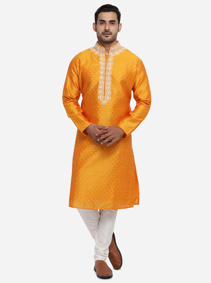 Elevate your ethnic wear with this stylish orange kurta pajama set.