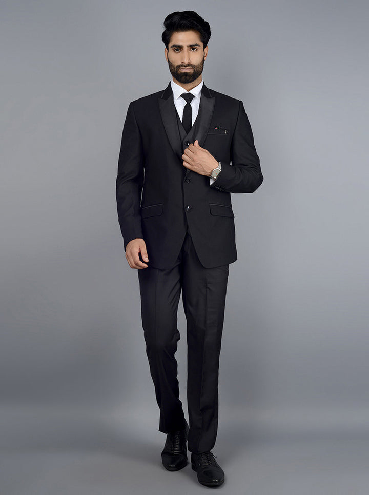 High-quality black suit for men, ideal for making a lasting impression at weddings and formal gatherings.