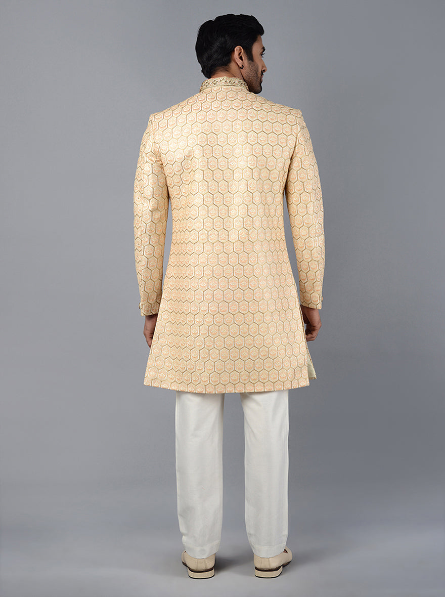 Embrace modern elegance with this Cream & Peach Embroidered Indo Western Jacket, ideal for weddings.