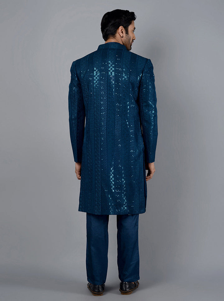 Elevate your ethnic style with this chic Teal Blue Indo Western, tailored for weddings and festive occasions.