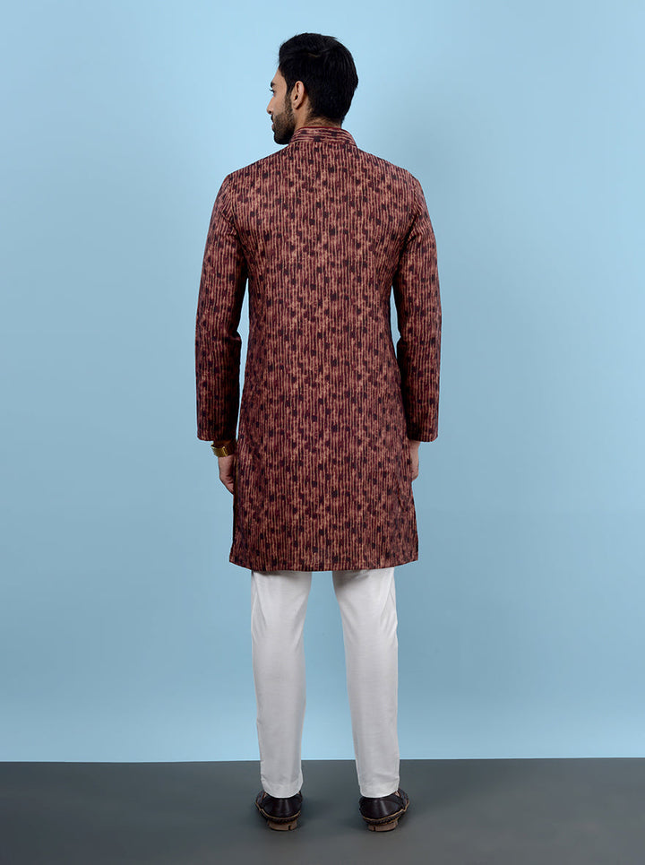 Perfect for festive occasions, this Rust Brown Kurta Pajama ensures you look your best.