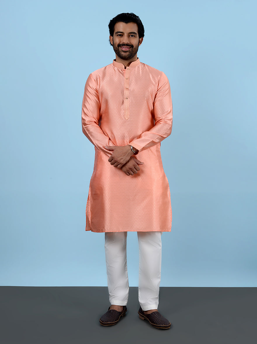 Step into sophistication with this beautifully designed Peach Kurta Pajama for special occasions.