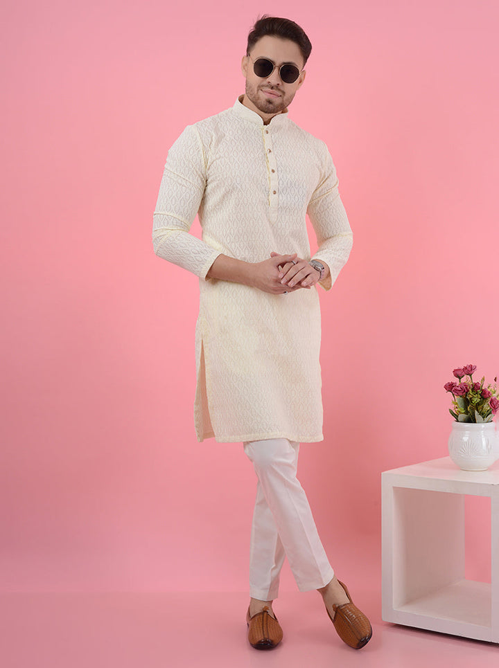 Experience sophistication with this cream silk kurta pajama, perfect for traditional gatherings in the USA.