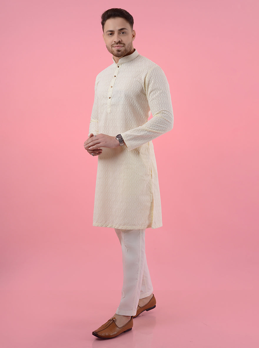 Discover the beauty of this cream silk kurta pajama, embroidered with intricate designs for stylish events in the USA.