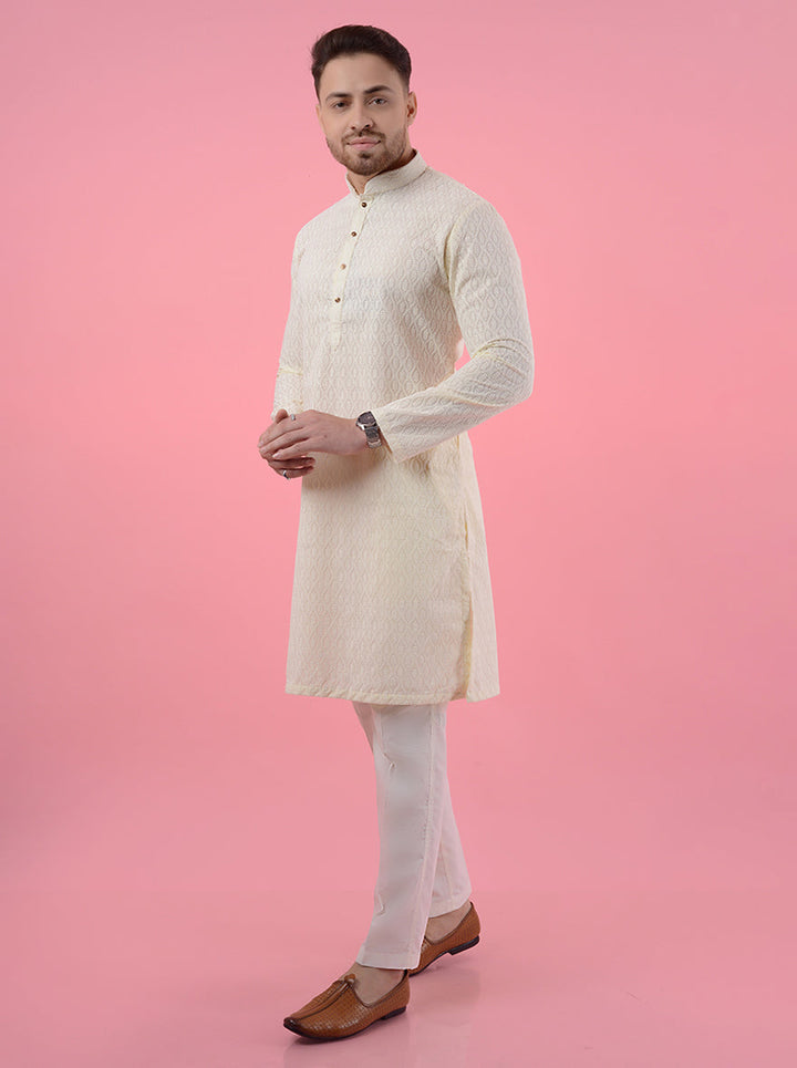 Cream silk blend kurta pajama set for men, featuring fine embroidery for ethnic occasions.