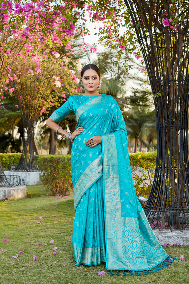 Stylish sky-blue satin silk Kanjivaram saree with beautiful butta work and woven pallu, perfect for traditional wear.