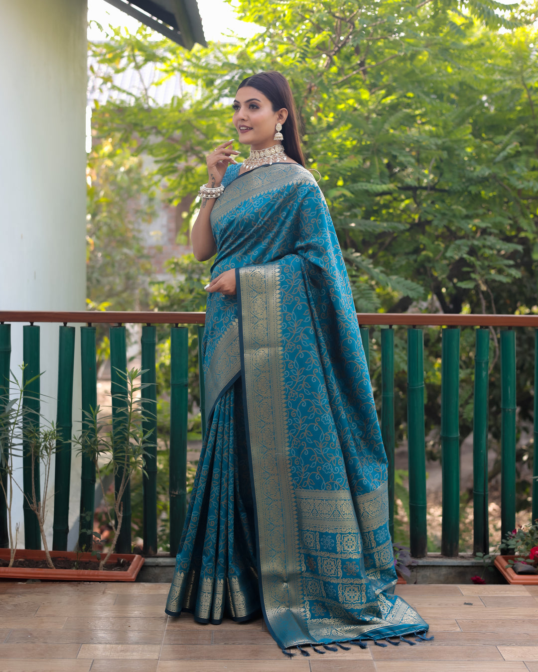 Blue Handloom Bandhej Patola Silk Saree with rich Zari work and Kanchi borders for USA traditional celebrations.