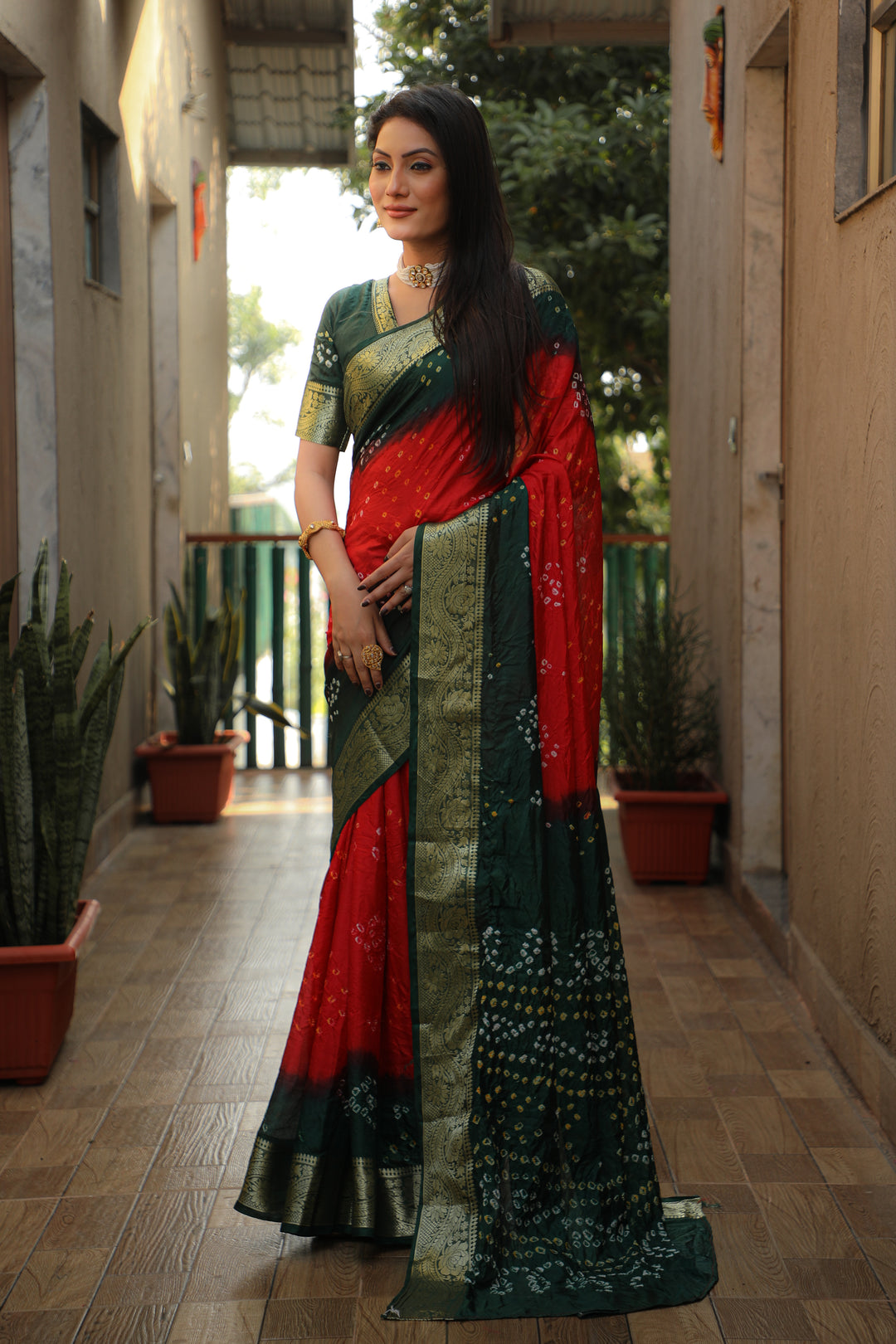 Beautiful green Bandhej Tapeta saree, featuring traditional elegance and intricate design.