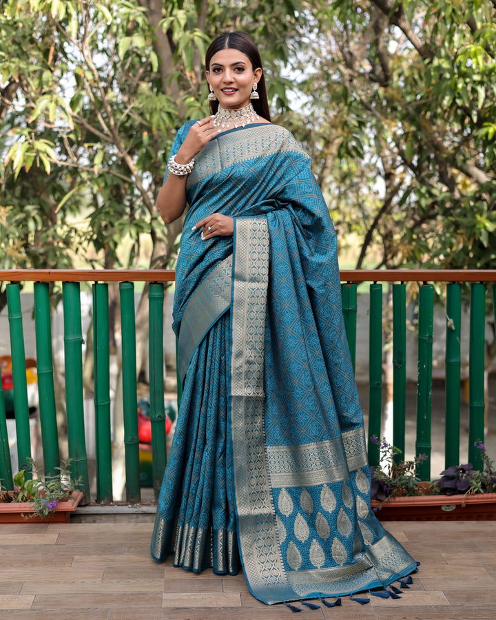 Stunning designer saree in deep blue with a dazzling contrast zari border, perfect for cultural celebrations.