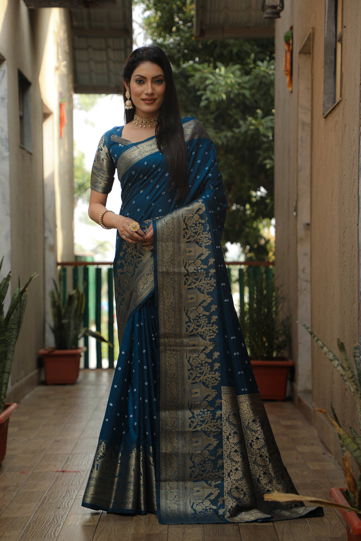 Elegant teal Kanjivaram silk saree with rich pallu and detailed work, ideal for weddings.