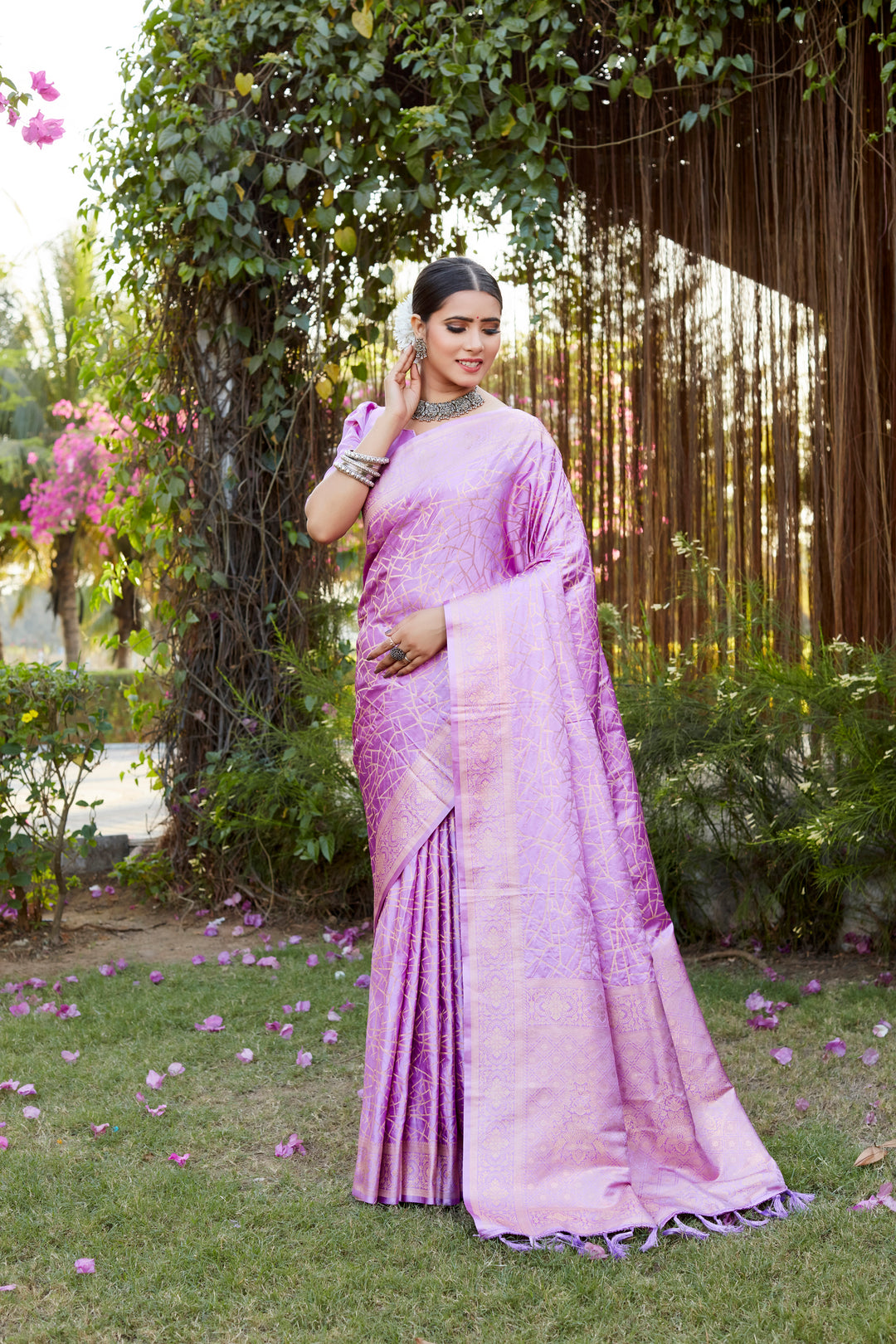 Gorgeous pink Kanjivaram soft satin silk saree with intricate butta work, perfect for grand celebrations and parties.