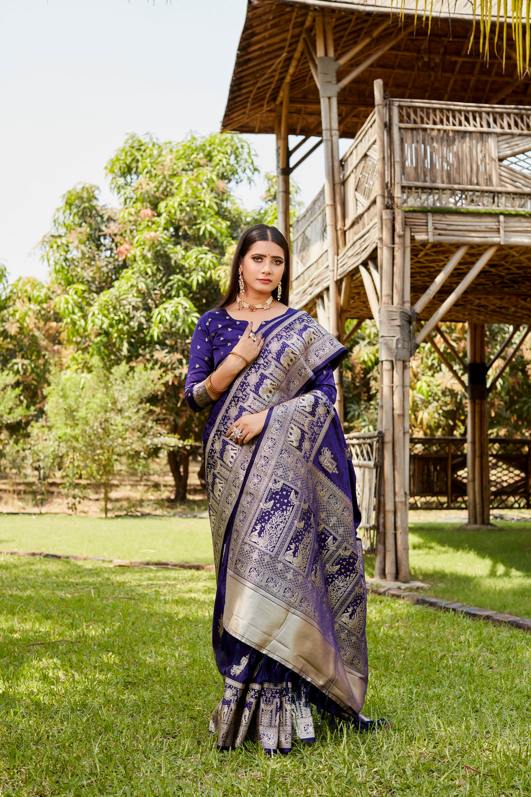 Gorgeous navy satin Kanjivaram saree with intricate elephant border details, perfect for weddings and special celebrations.