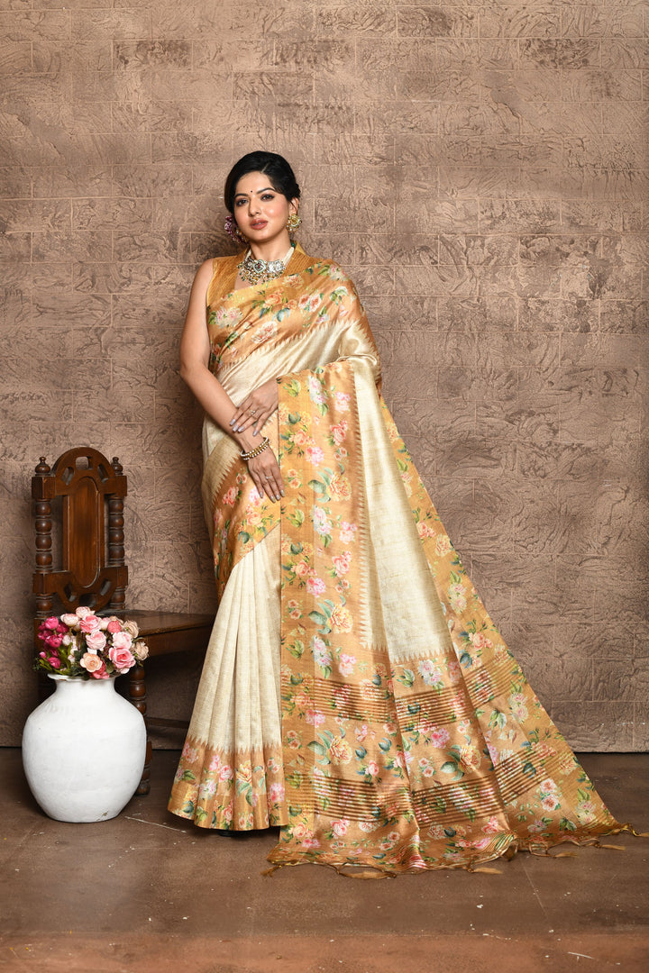 Tussar silk saree with all-over print, floral contrast pallu, and tassels