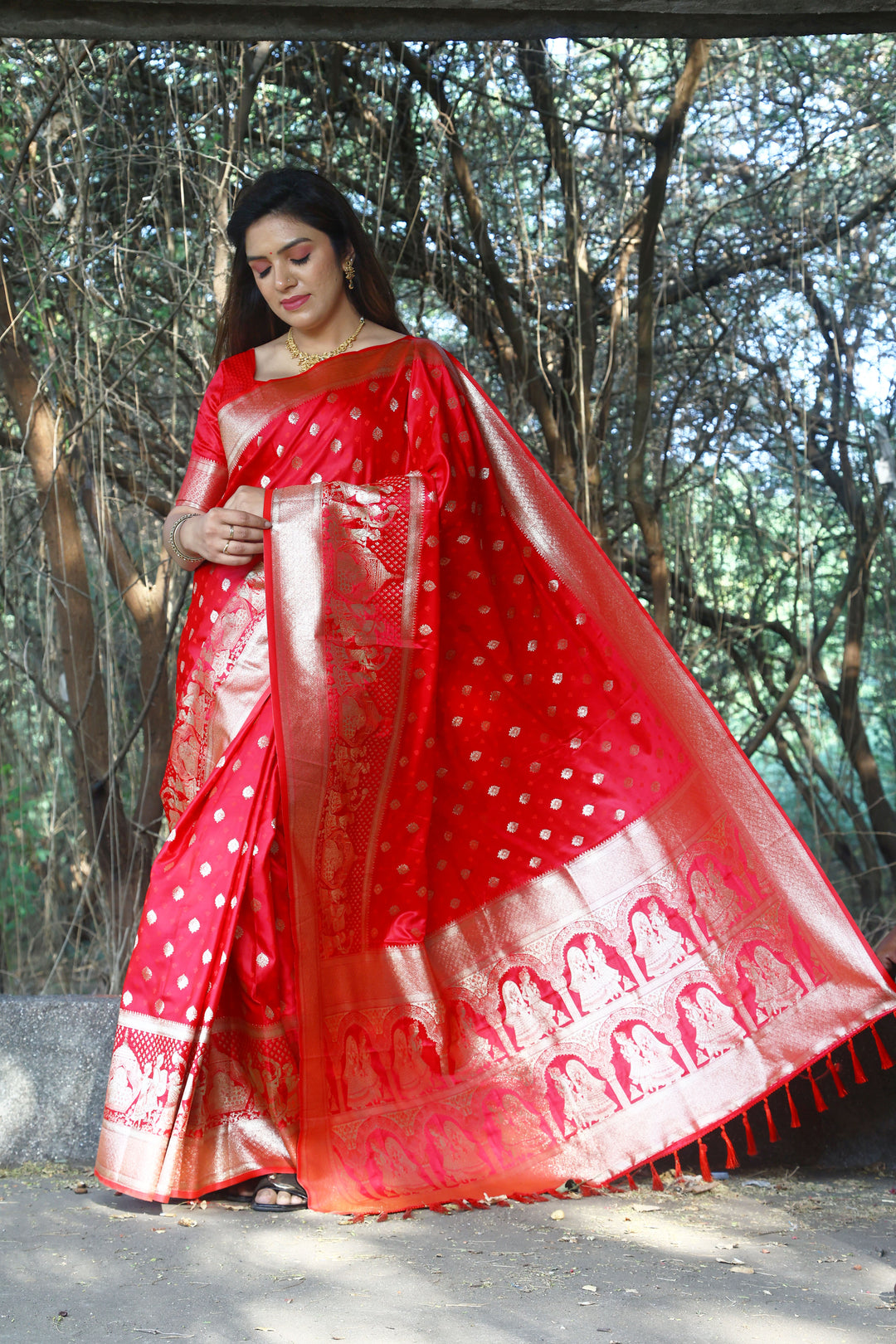 Graceful blue satin silk saree featuring intricate Kanjivaram weaving design, perfect for cultural celebrations.