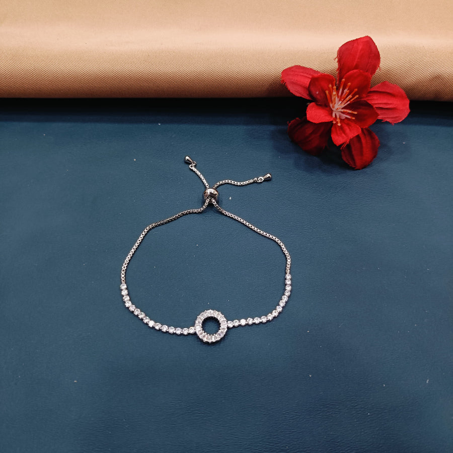 Elegant silver bracelet adorned with dangling charms, perfect for playful styles.