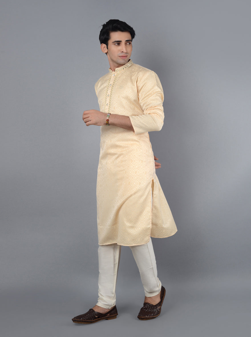 Discover luxury with this Fawn Kurta Set, perfect for enhancing your traditional wardrobe at special occasions.