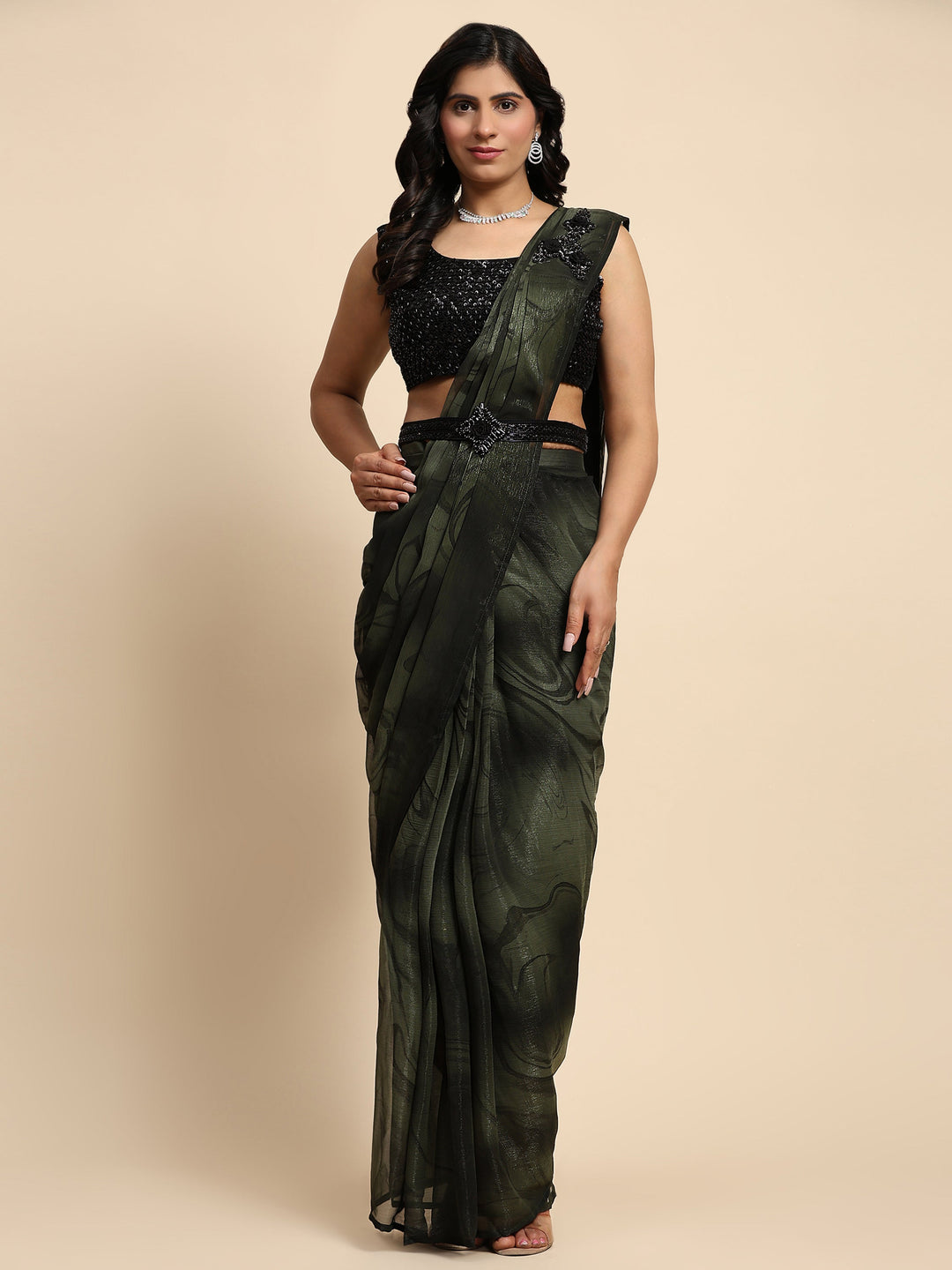 Green silk saree crafted for elegance and style.