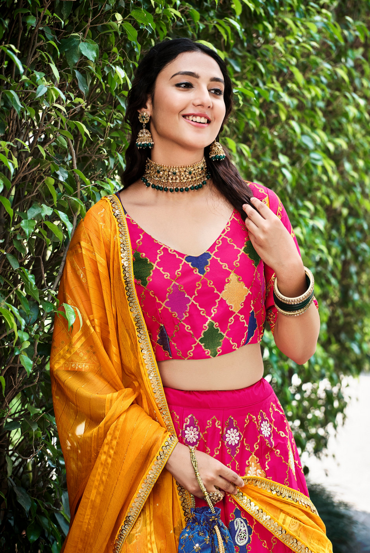 Sophisticated Pink Silk Lehenga with Yellow Dupatta | Crafted for Timeless Elegance