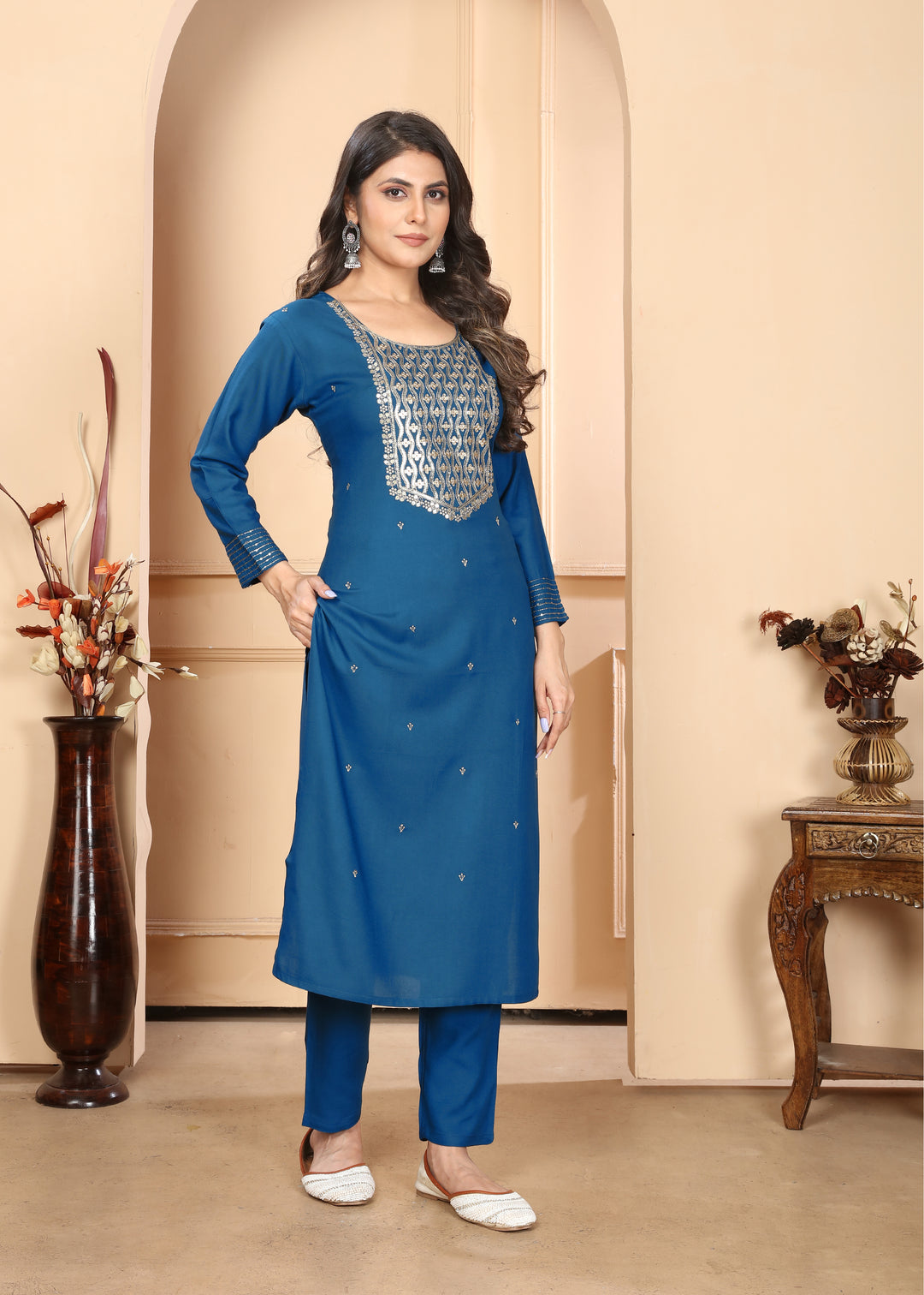 Elegant Rayon Salwar Kameez with Intricate Embroidery and Matching Dupatta