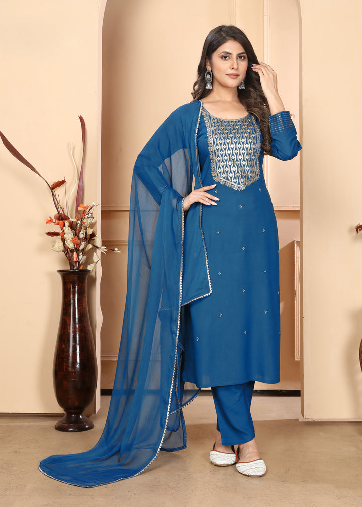 Elegant Rayon Salwar Kameez with Intricate Embroidery and Matching Dupatta