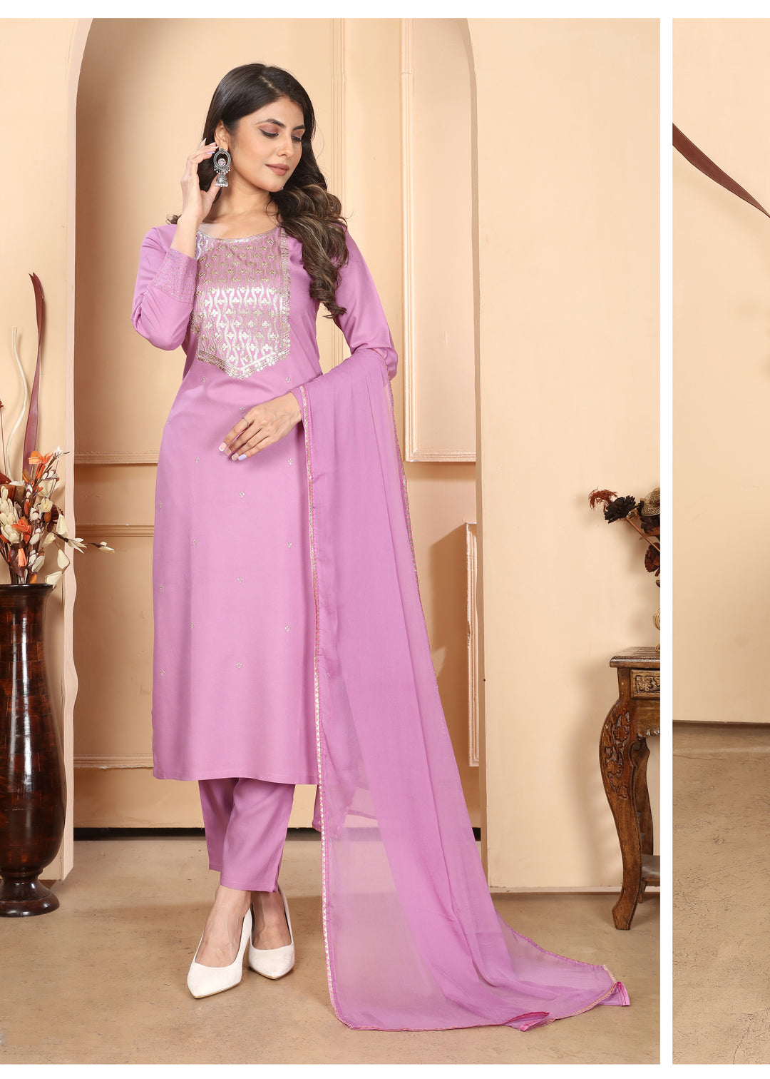 Elegant Rayon Salwar Kameez with Intricate Embroidery and Matching Dupatta